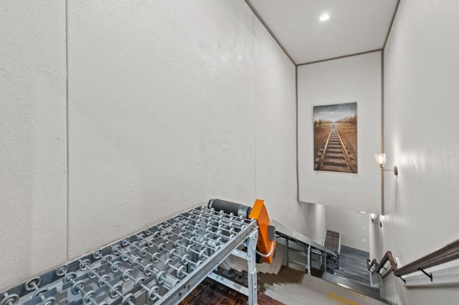 Hall with an upstairs landing and wood finished floors | Image 11