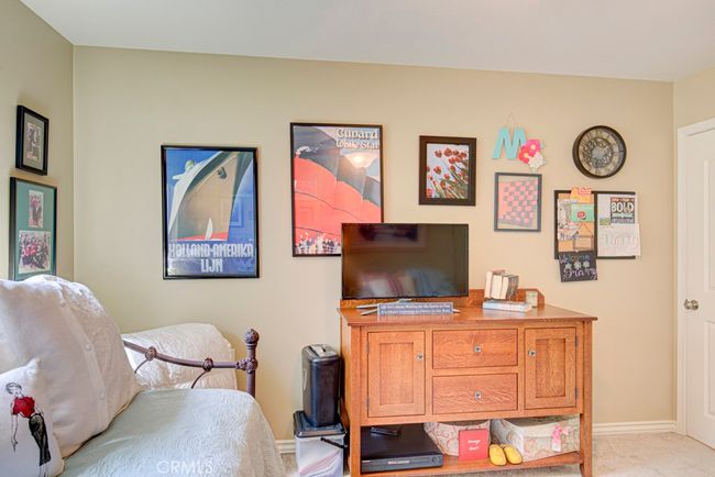 Another view of the guest bedroom. | Image 25