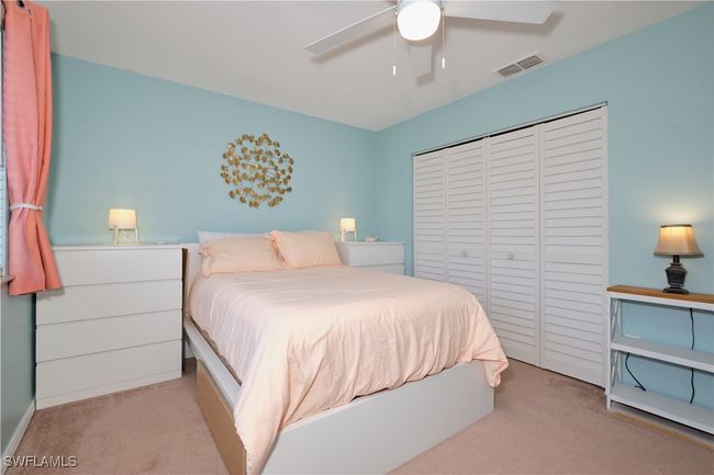 Bedroom featuring carpet, a closet, and ceiling fan | Image 26