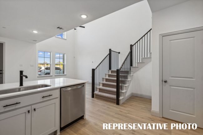 The chef will never be left out of the party in this open concept dream home! REPRESENTATIVE PHOTO | Image 8