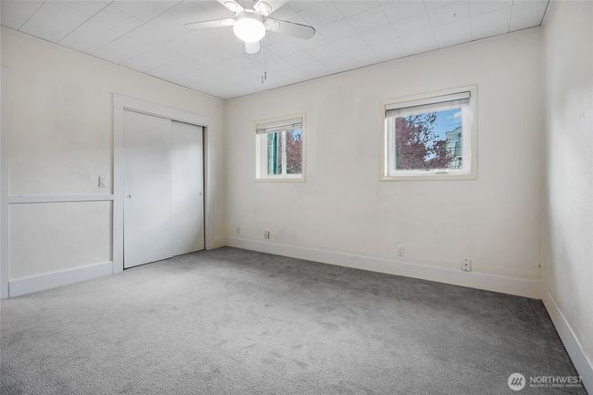First bedroom suite, with a breezy ceiling fan. | Image 12
