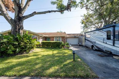 1733 Oakdale Lane E, House other with 4 bedrooms, 2 bathrooms and null parking in Clearwater FL | Image 2