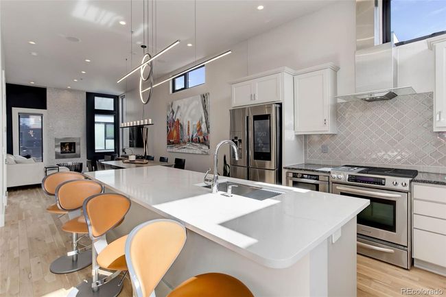 Bright and airy remodeled kitchen with a grilling deck located off the kitchen, fully plumbed with natural gas. | Image 5