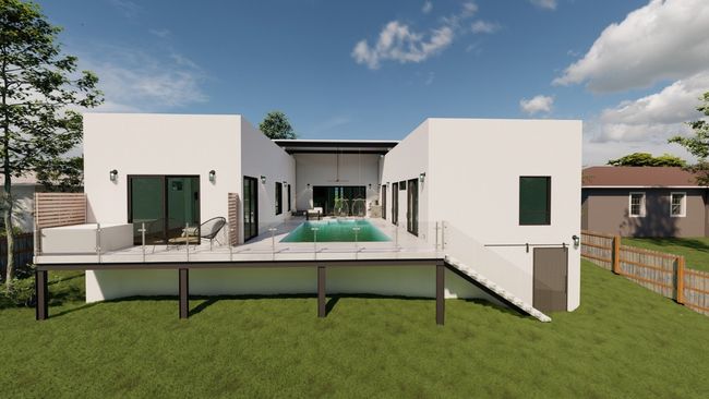 Back of house featuring stucco siding and stairway | Image 24