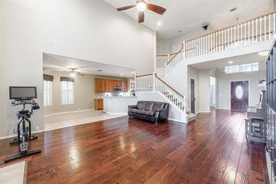 View showing the open floor plan with two-story foyer, catwalk, and lots of natural light. | Image 3