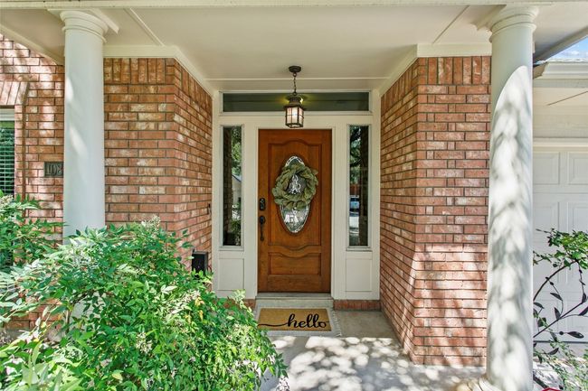 Covered porch to greet guests | Image 6