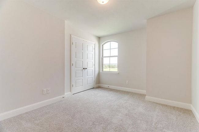 Empty room featuring light carpet | Image 28