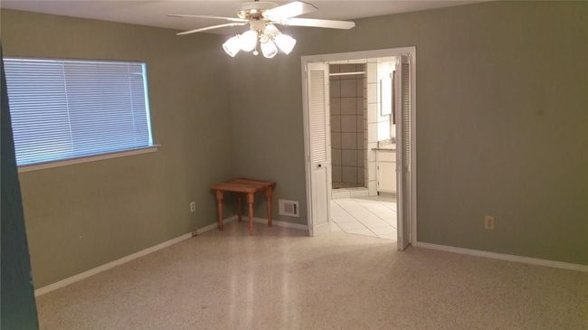 Unfurnished room featuring ceiling fan, baseboards, and carpet | Image 9