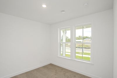 Full bed & bath off front of home on first floor. | Image 3