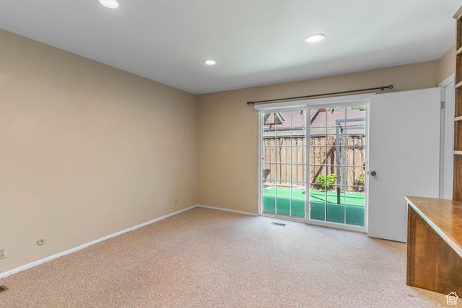 Unfurnished room with recessed lighting, baseboards, visible vents, and light colored carpet | Image 13