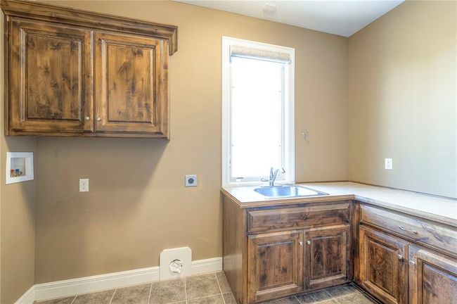 main floor laundry w sink | Image 32