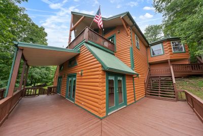 Double decks for relaxing both upstairs and downstairs. All decks, stairs & walkways have been updated with new wood, sanded & stained. | Image 2