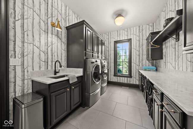 main level laundry, tons of space | Image 47