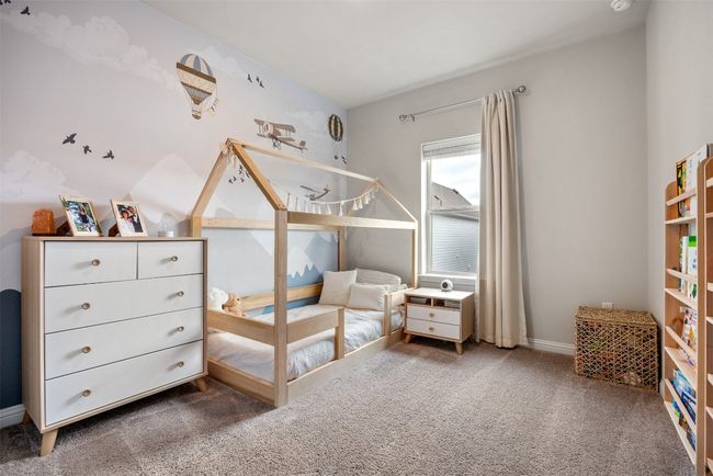 Carpeted bedroom featuring baseboards | Image 12