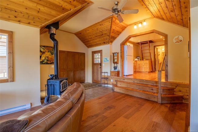 View from living room towards entrance and kitchen | Image 12