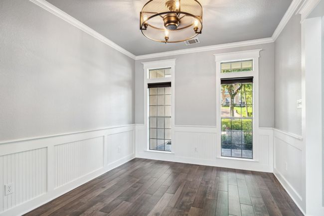 Formal dining room with lots of natural light | Image 9