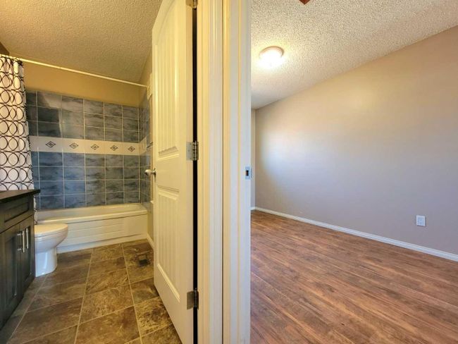 9406 81 Avenue, Home with 4 bedrooms, 2 bathrooms and 2 parking in Grande Prairie AB | Image 18