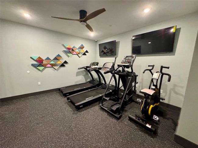 Exercise room featuring ceiling fan, baseboards, and recessed lighting | Image 5
