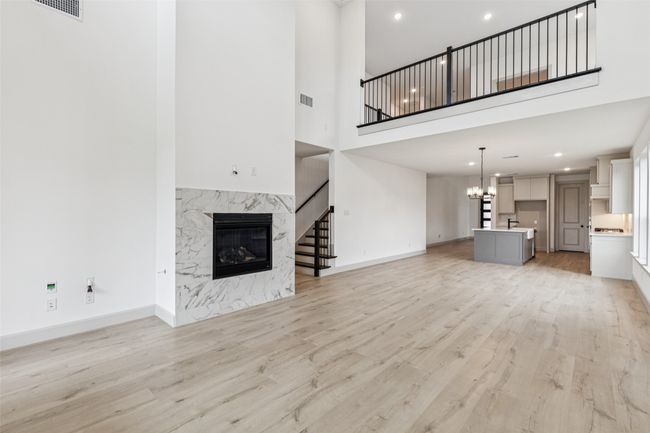 The game room is open to the main floor living area creating a multi-level entertainment zone! | Image 10