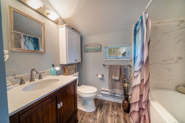 Attached bath has a whirlpool tub | Image 14