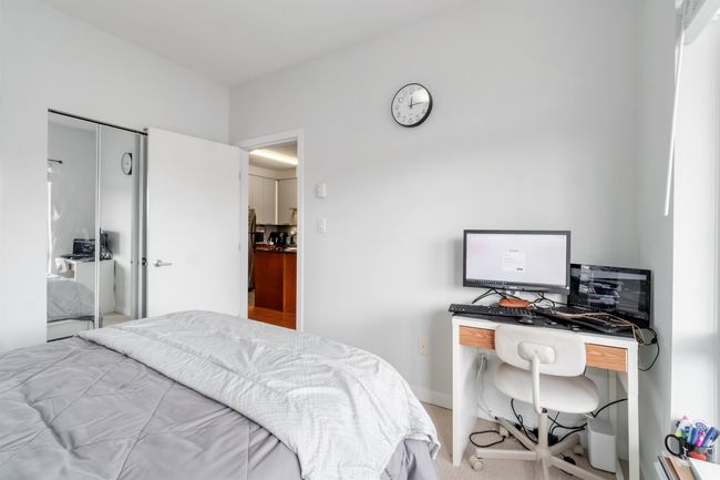 Bedroom with freestanding refrigerator | Image 21