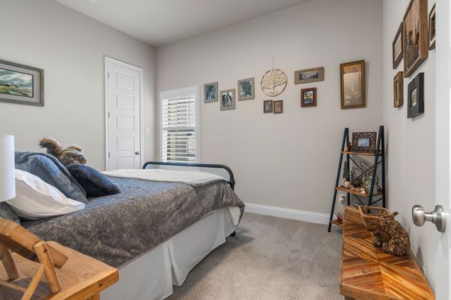 Bedroom featuring carpet and baseboards | Image 20