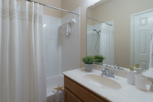 Full bath with shower / bath combo with shower curtain and vanity | Image 15