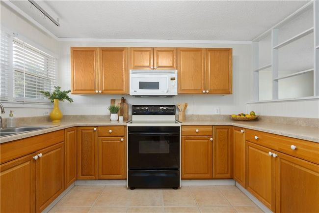 9616 Lake Lotawana Dr, House other with 3 bedrooms, 2 bathrooms and null parking in Lees Summit MO | Image 12