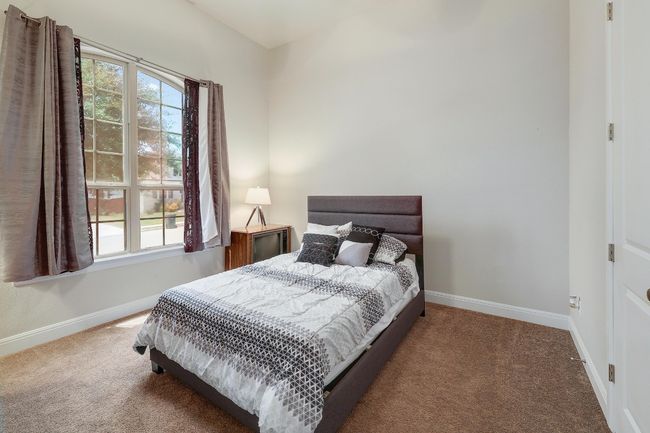 Bedroom featuring carpet | Image 24