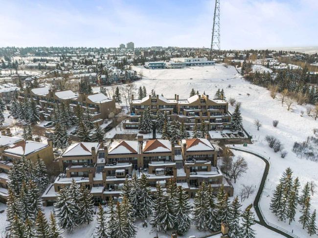8 - 122 Village Heights Sw, Home with 2 bedrooms, 1 bathrooms and 2 parking in Calgary AB | Image 3