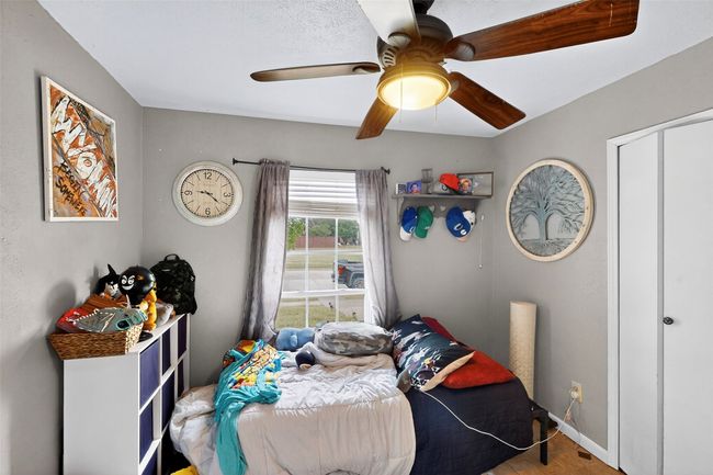 Bedroom with baseboards and a ceiling fan | Image 12