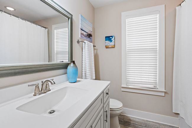 Another lovely full bath is easily accessible to both of these bedrooms. | Image 20