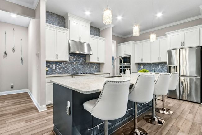 Quartz counters, tile backsplash, appliances included | Image 15