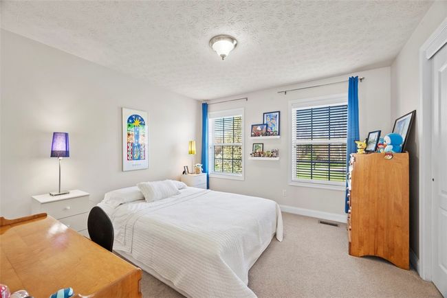 Neutral tones are found in all of the bedrooms. | Image 32