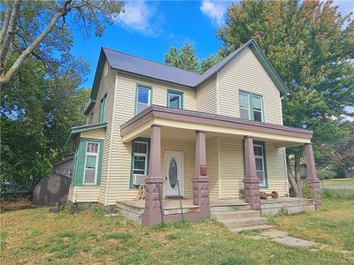 View of front of property featuring a porch | Image 1