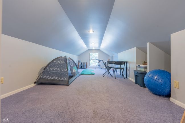 game room with lofted ceiling, baseboards, and carpet flooring | Image 28