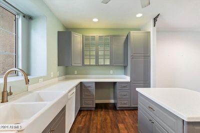 Warm & inviting kitchen with new paint, farmhouse sink and bright sunshine. | Image 3