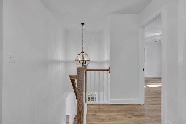 Upstairs view with tall ceilings. | Image 30