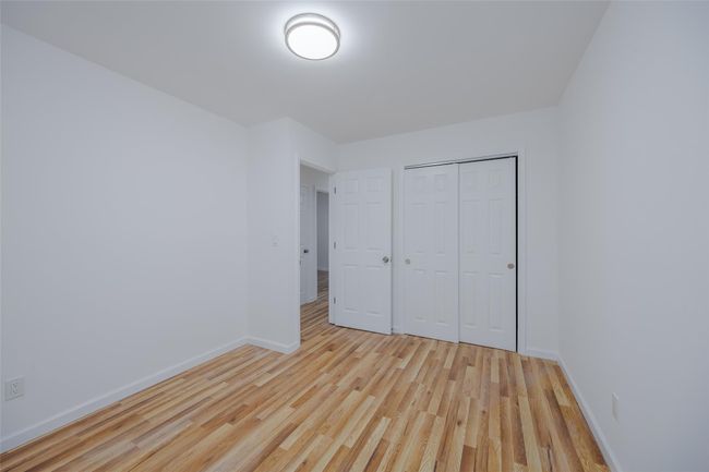 bedroom featuring light wood-type flooring | Image 25