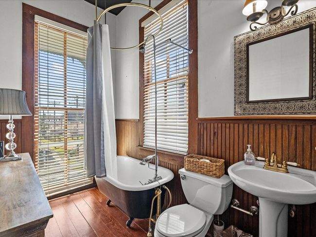 Primary bath with all the Victorian charm | Image 38