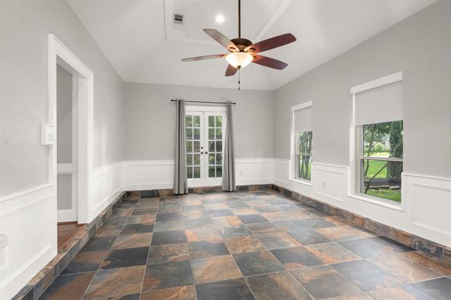 Game room keeps entertaining and kids’ playtime conveniently within earshot, offering a spacious yet connected area that supports both fun and supervision. | Image 22