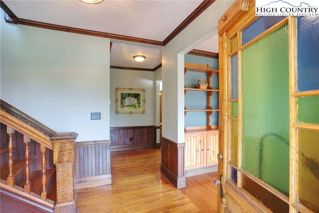 Enter thru the stained glass front door into the foyer area. | Image 5
