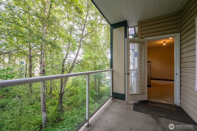 Deck with door into living area | Image 21