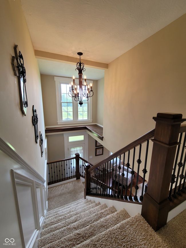 View of foyer and landing. | Image 69