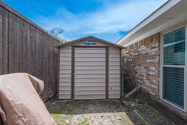 View of shed featuring fence | Image 35