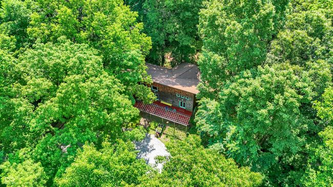 Aerial view of home amid 8.3 secluded acres | Image 15