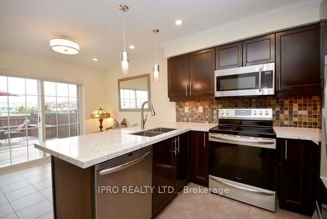 867 Fowles Crt, House attached with 4 bedrooms, 3 bathrooms and 2 parking in Milton ON | Image 19
