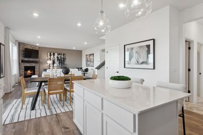 (Photo of model home, actual features may vary) The kitchen island is big enough for additional seating options | Image 1