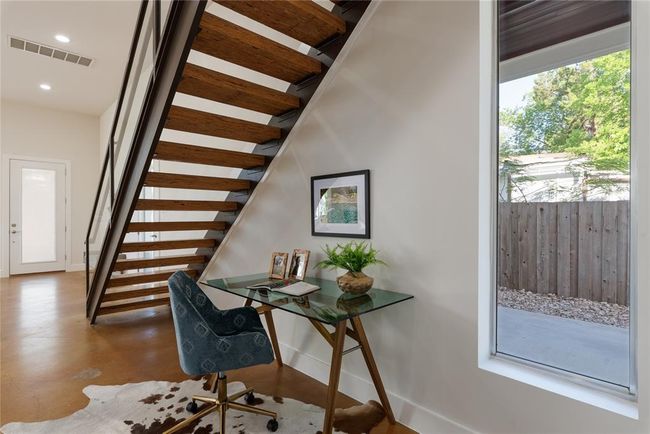 Home office with baseboards, finished concrete floors, and recessed lighting | Image 7