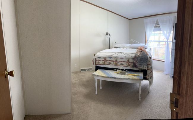 2nd of three bedrooms features tons of natural light. | Image 24